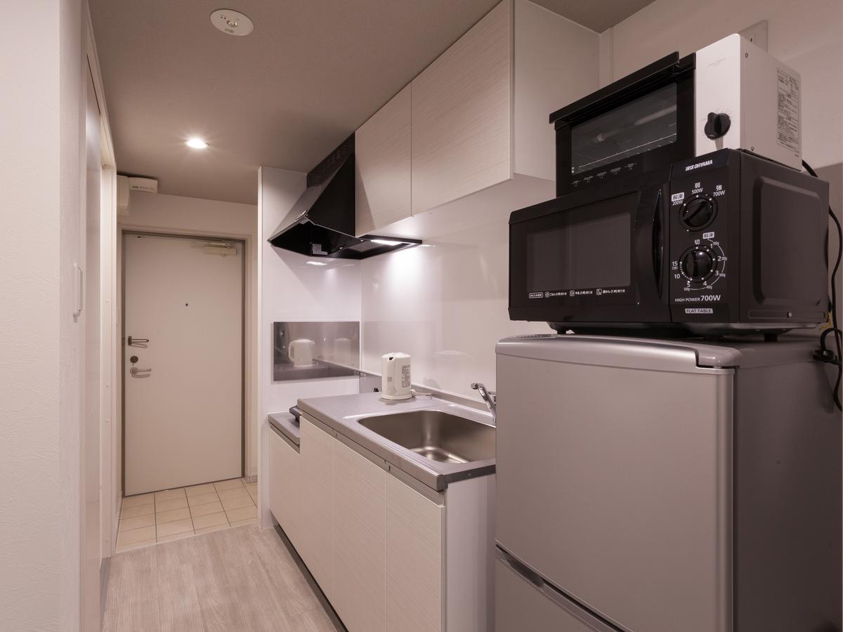Kariyushi Condominium Resort Chatan Araha Sunset Екстериор снимка